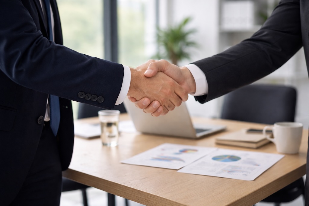 picture of two people handshaking